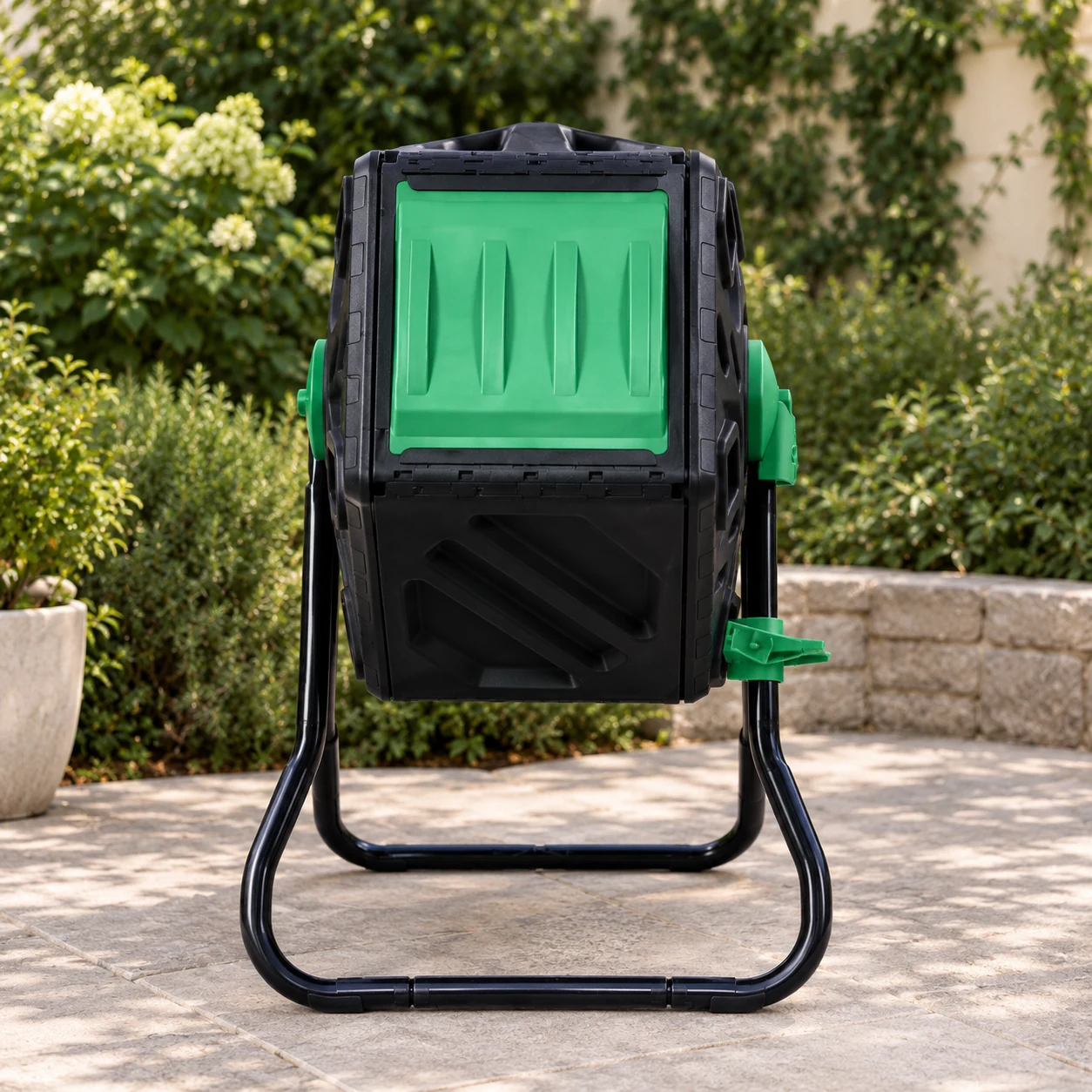 Front view of the compact black tumbler with its single green panel