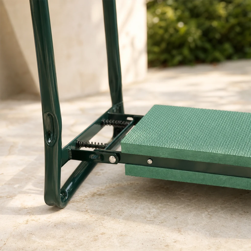 Green kneeler pad and folding spring joint in close detail